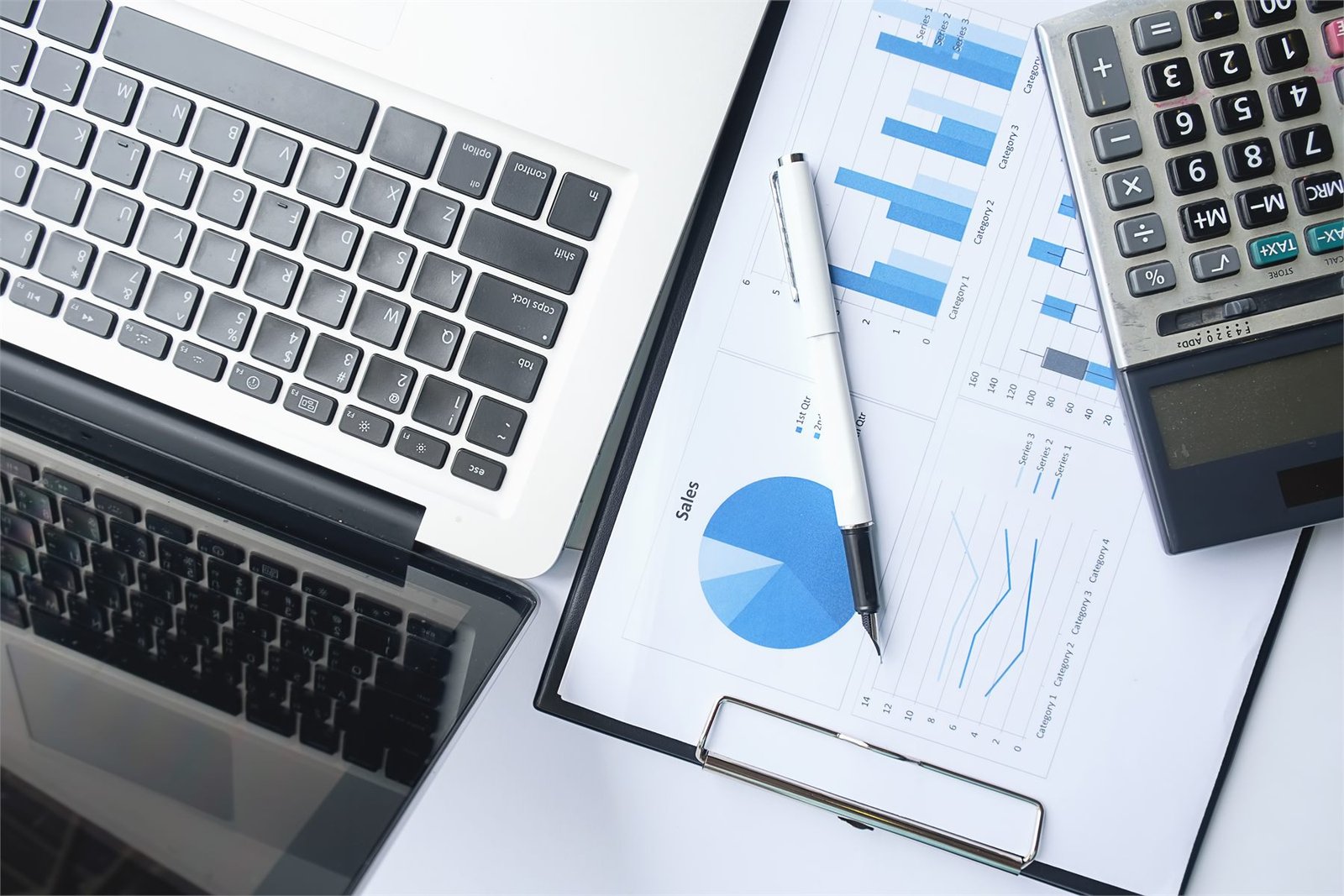 Accountant reconciling ledgers and preparing management accounts
